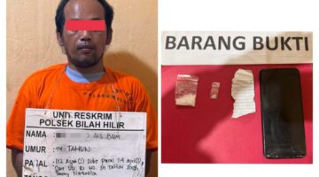 Tak Berkutik, Baim Diduga Pengedar Narkoba Diringkus Team Unit Reskrim Polsek Bilah Hilir di Desa Sidorukun Pangkatan.